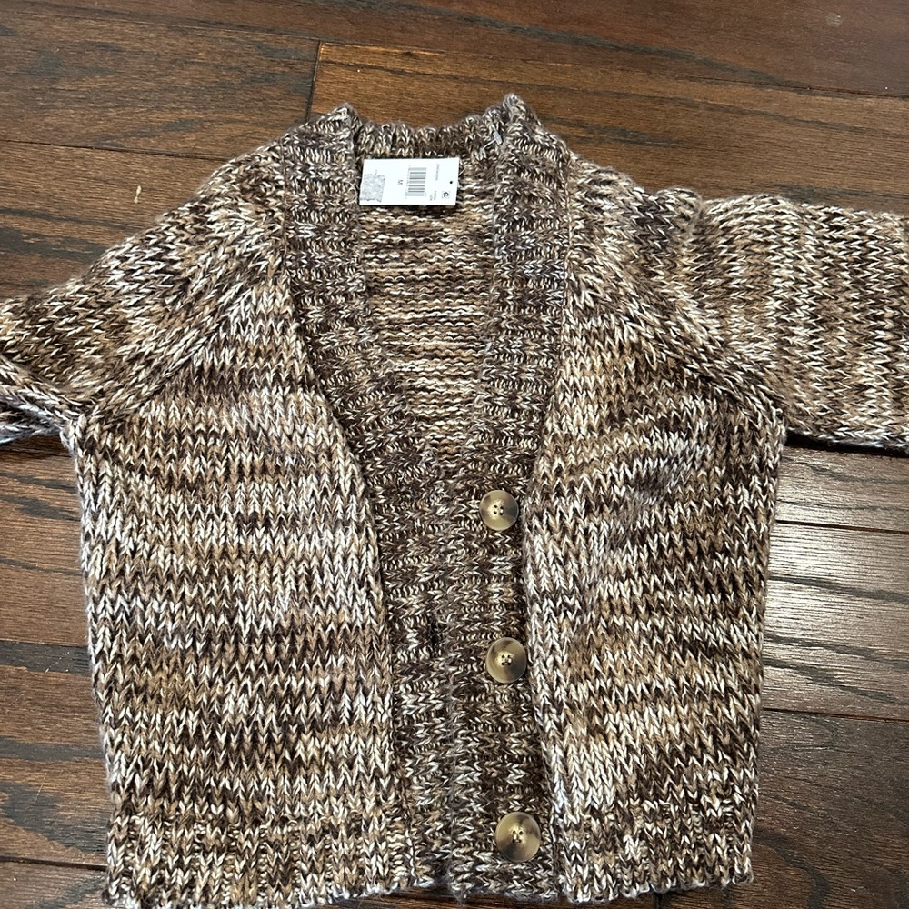 Brand new sweater size medium, never worn with tags